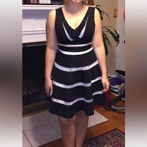 Beautiful black dress with cut out, fully lined